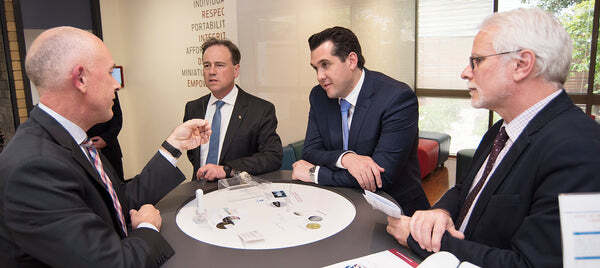 Photo (L-R): Mr Stephen Tomisich, Chief Executive Officer, Trajan, Hon. Greg Hunt MP, Federal Minister for Industry, Innovation and Science, Australia, Mr Michael Sukkar MP, Federal Member for Deakin, Victoria, Australia, Dr Andrew Gooley, Chief Scientific Officer, Trajan.